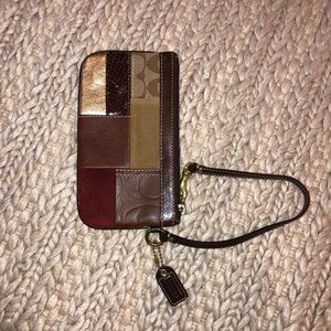 Coach patchwork wristlet in brown, burgundy, gold